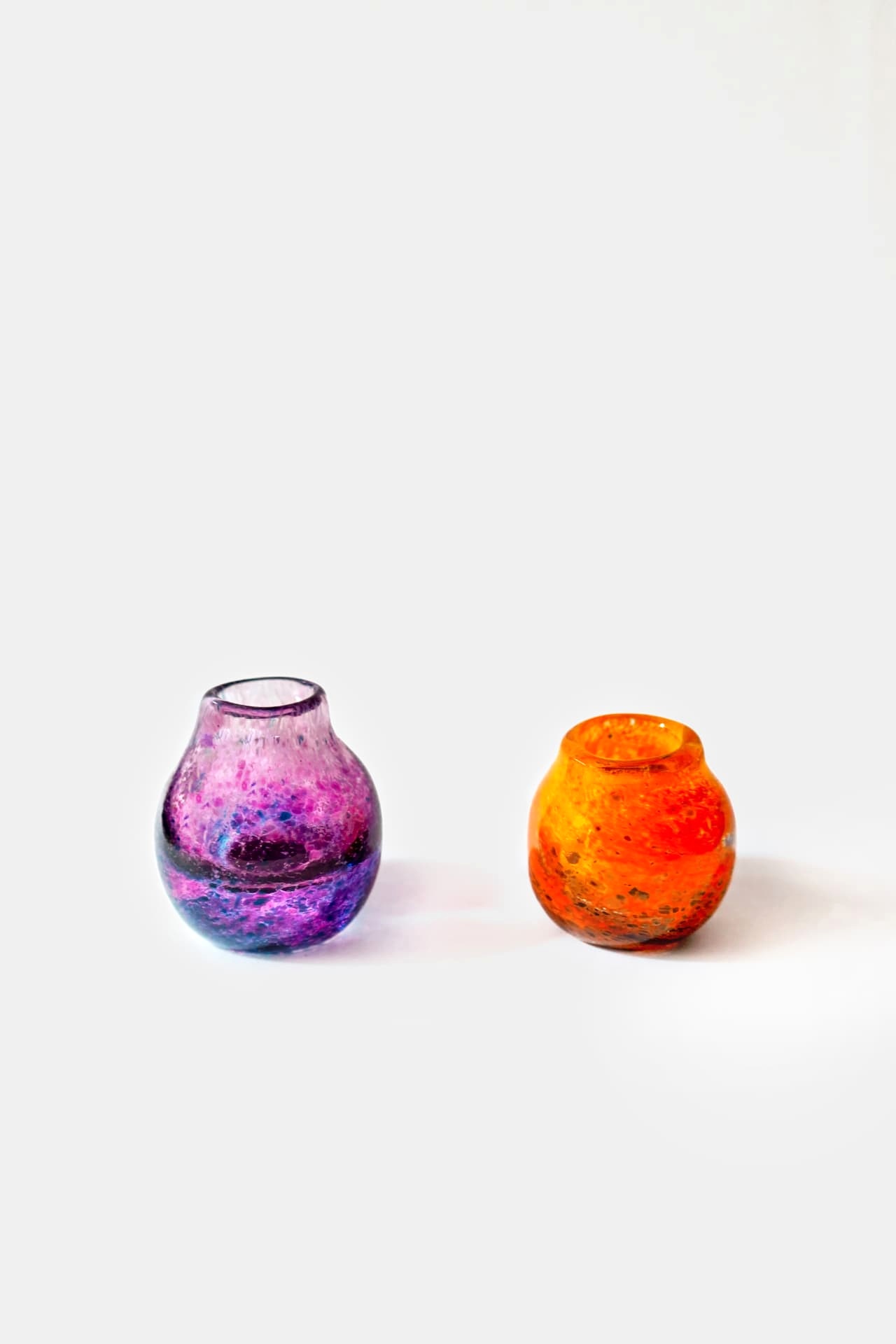 Small hand-blown glass vases by Zach Glassman
